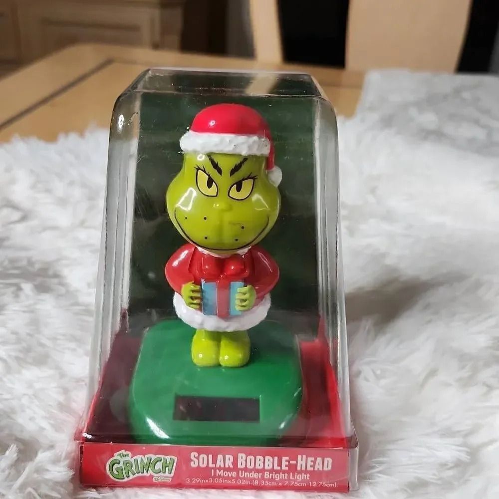 The Grinch solar Christmas bobblehead